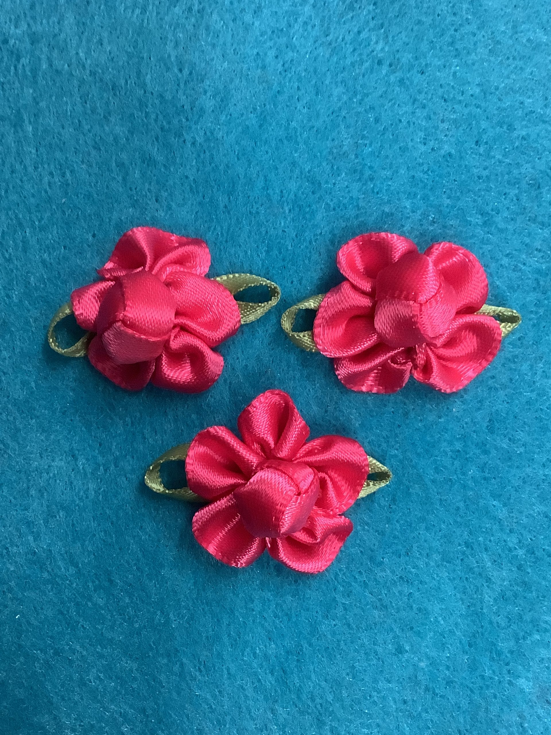 Cerise Pink Ribbon Flower with Ribbon Centre and Green Leaves (RF20